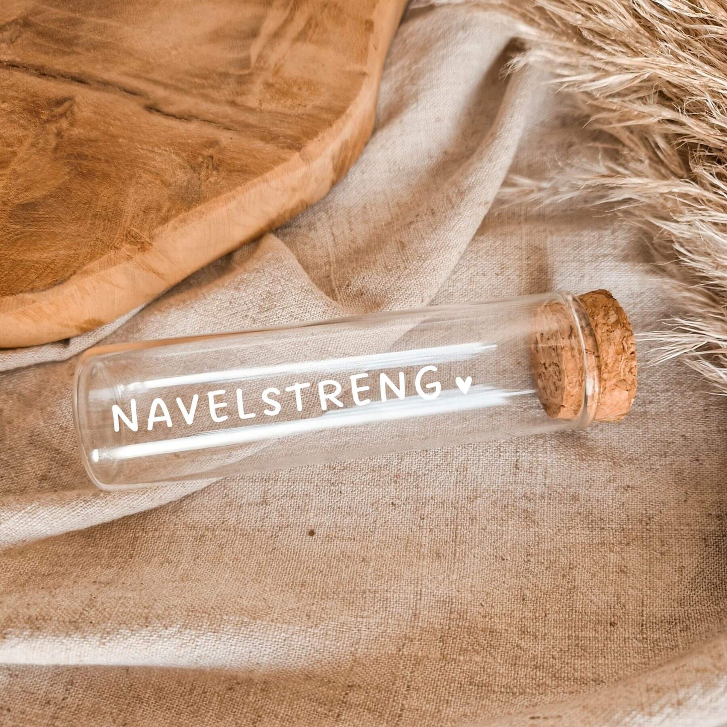 Glazen bewaarbuisje om de navelstreng of navelstrengklem in te bewaren wit