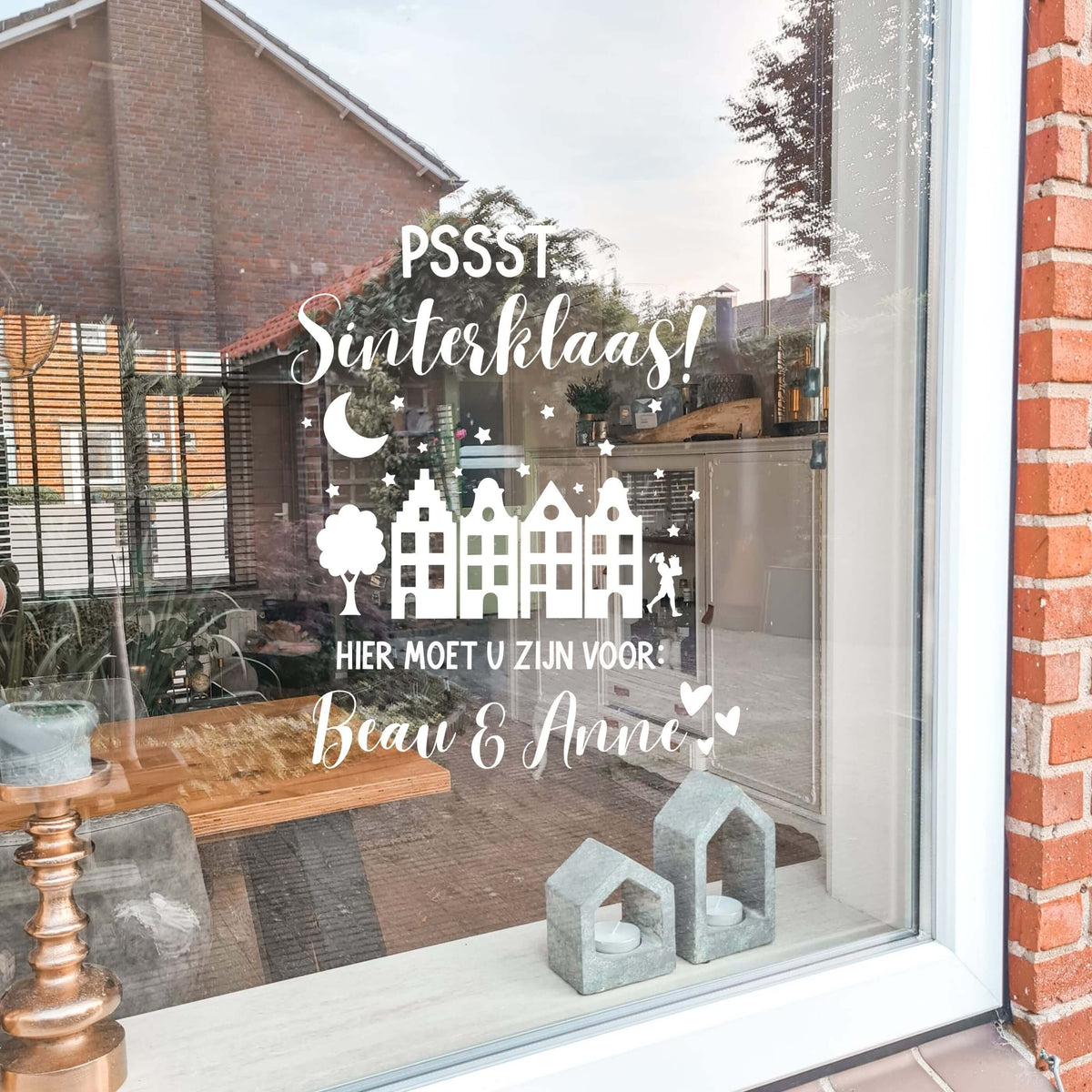 Gepersonaliseerde raamsticker Sinterklaas Pssst met naam op het raam
